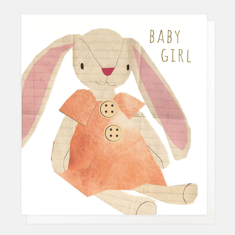 new baby girl card featuring a toy rabbit dressed in an orange dress with buttons