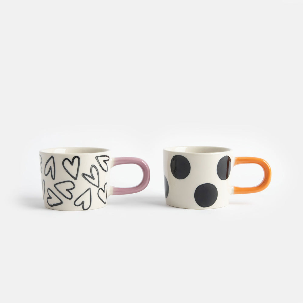 set of 2 hand painted stoneware espresso cups in spots and hearts designs