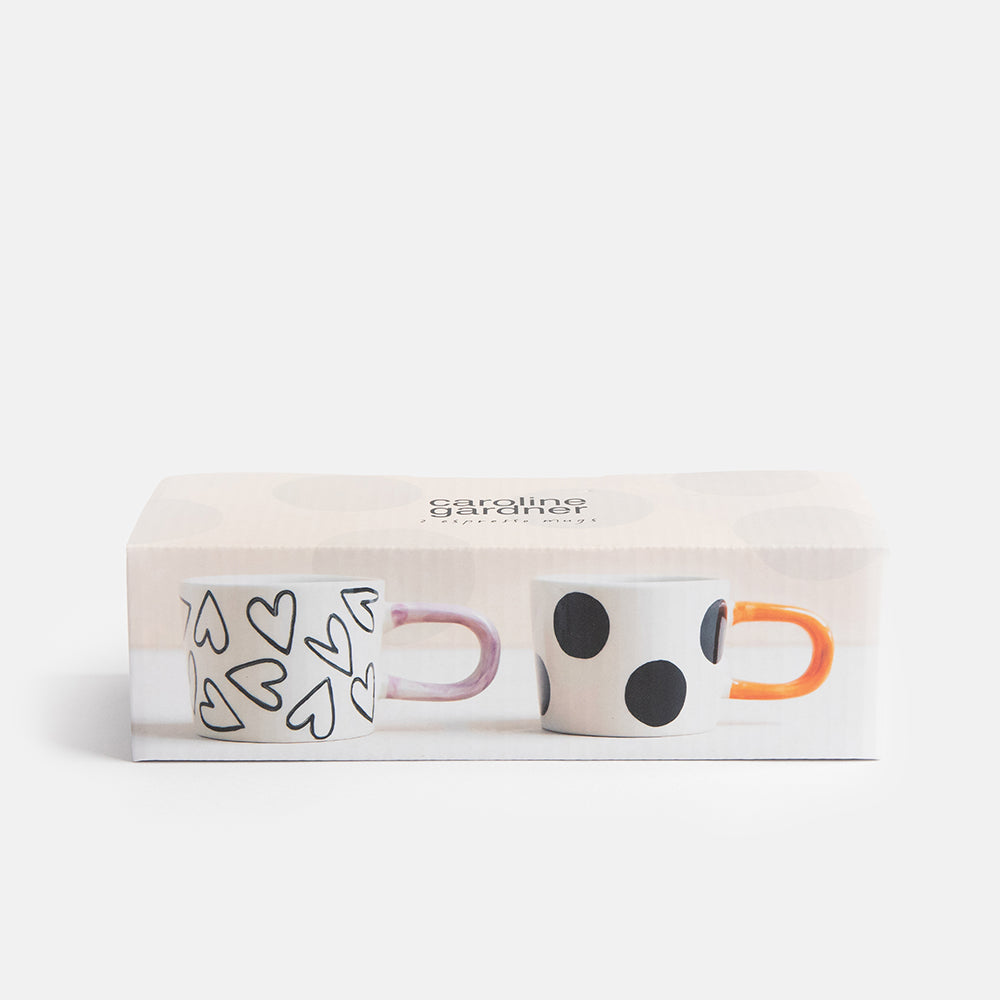 set of 2 hand painted stoneware espresso cups in spots and hearts designs with presentation box