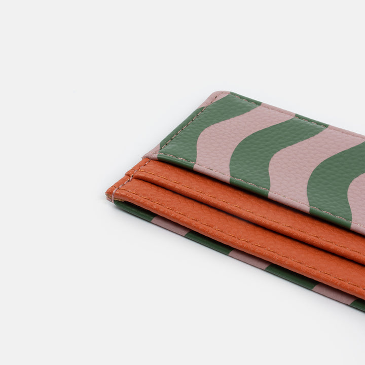 pink and green leather look card holder purse with orange contrast