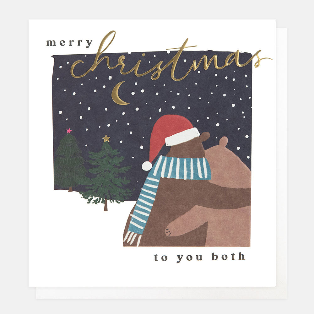 Christmas card featuring two bears hugging in a snowy night-time scene and the words merry Christmas to you both