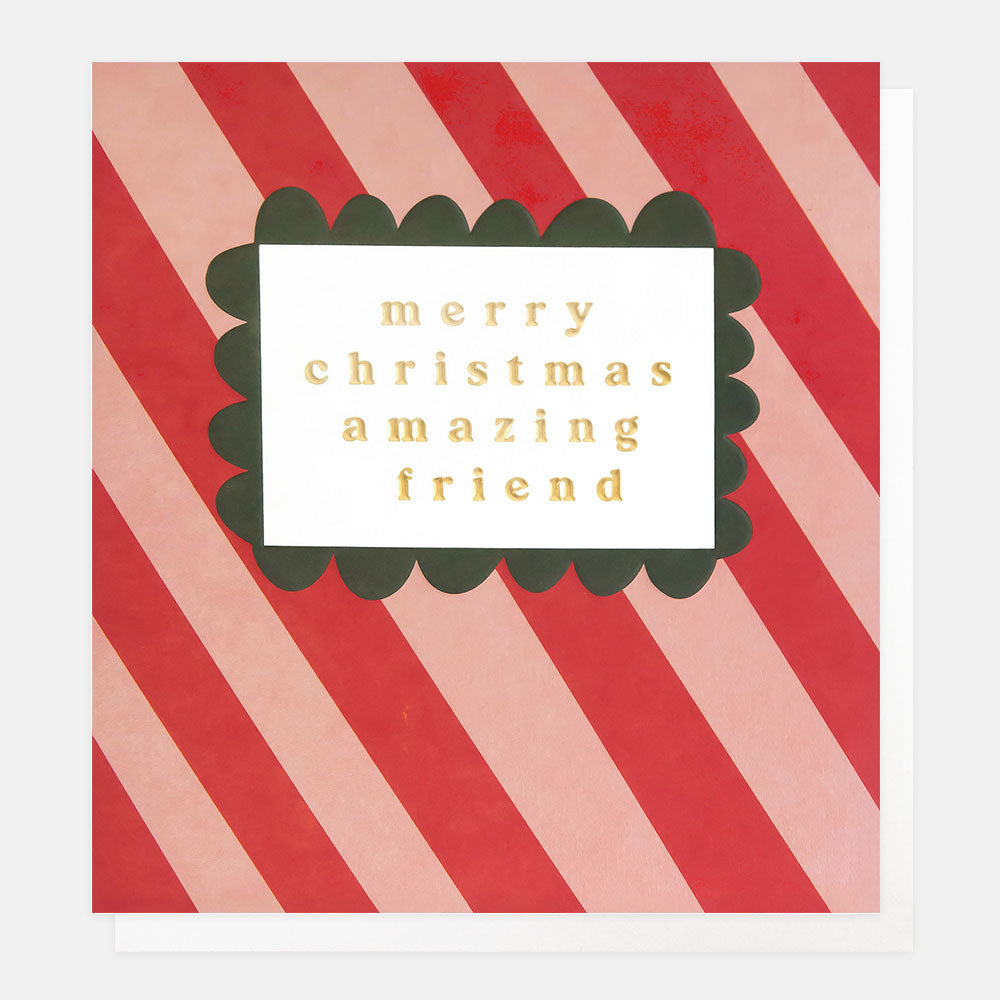 Christmas card featuring diagonal red & pink candy stripes and a green scalloped edged frame with the words merry Christmas amazing friend inside