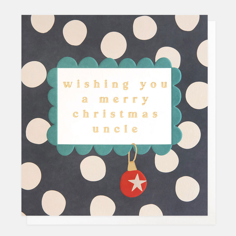 Christmas card featuring the words wishing you a merry Christmas uncle in a scallop edged frame on a navy with white spots background