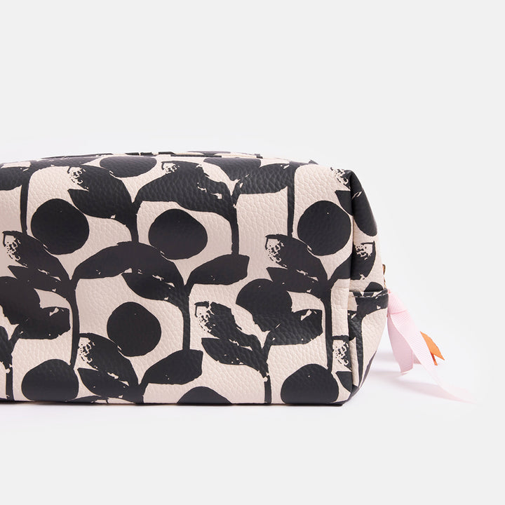 leather look large double zip wash bag in monochrome foliage print design