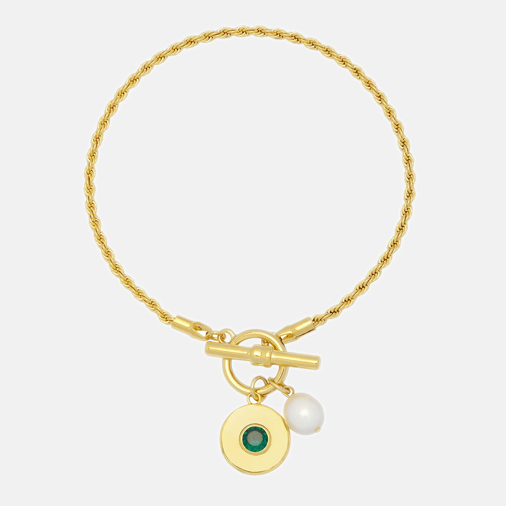 gold plated t bar rope bracelet with green cubic zirconia and pearl charms, made by Estella Bartlett