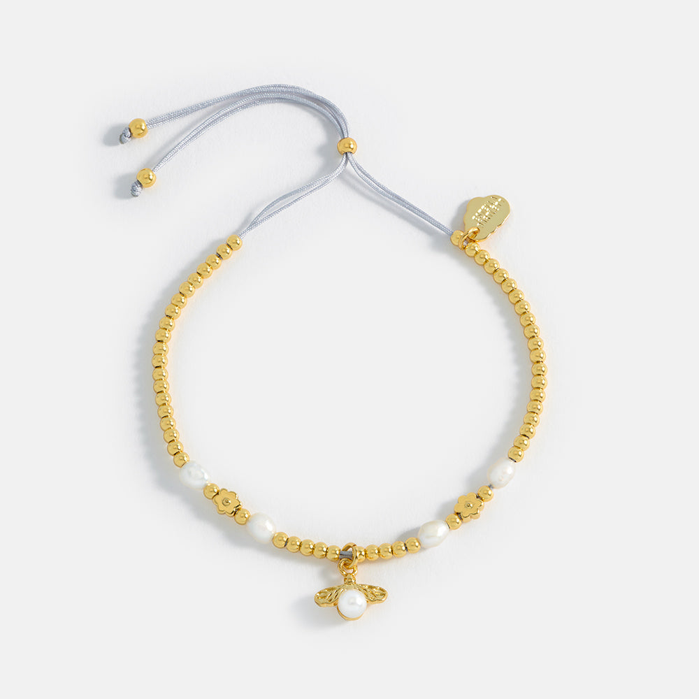 pearl & gold plated bee charm bracelet by Estella Bartlett