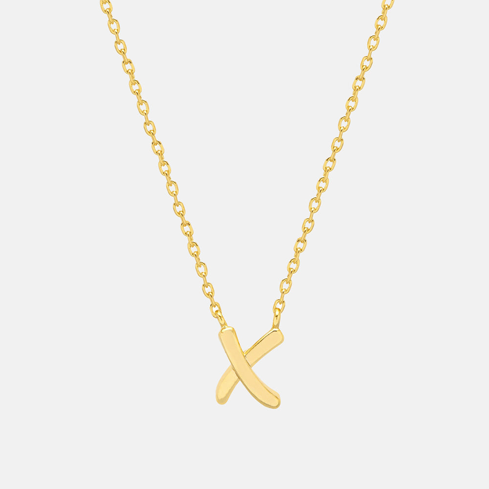 gold plated link necklace with kiss X charm, made by Estella Bartlett