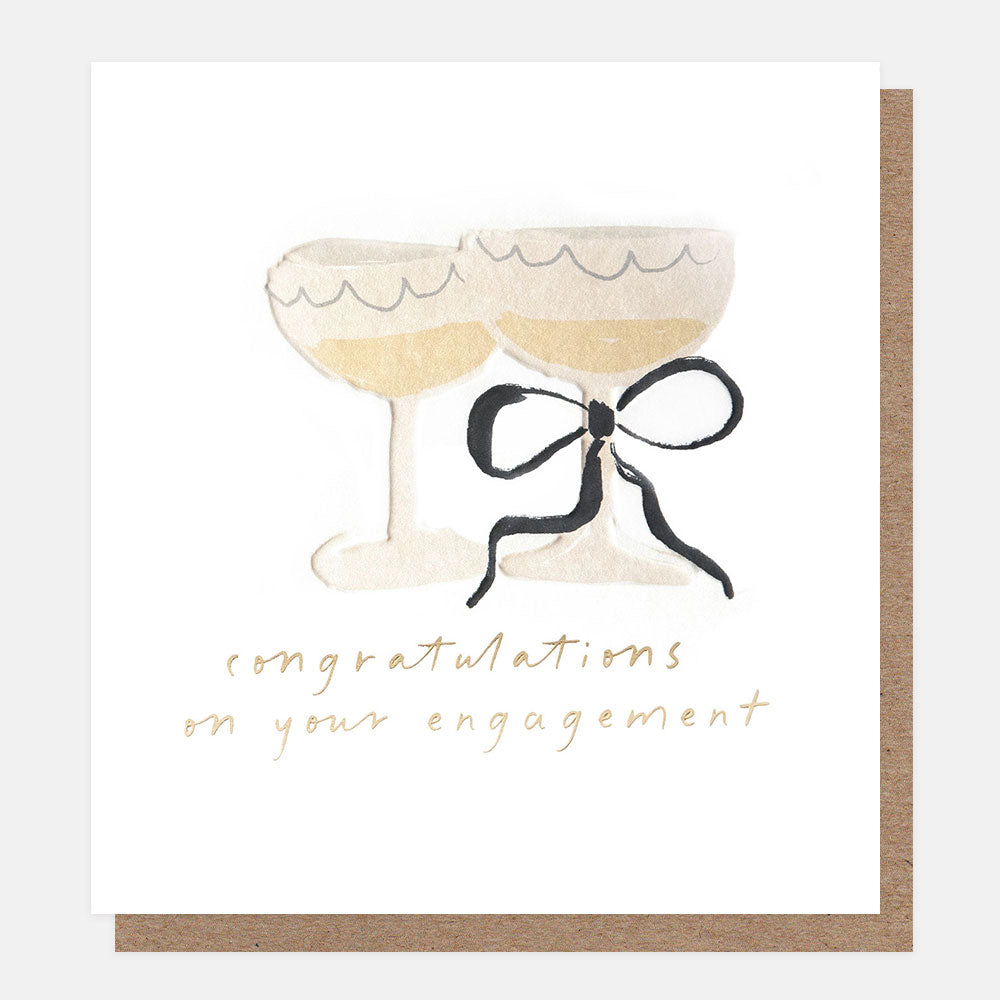 engagement card featuring two champagne glasses and the wording congratulations on your engagement