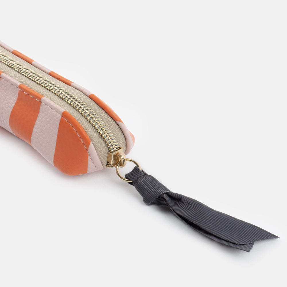 pink and orange stripe slim pencil case with gold zip and charcoal grey ribbon zip pull