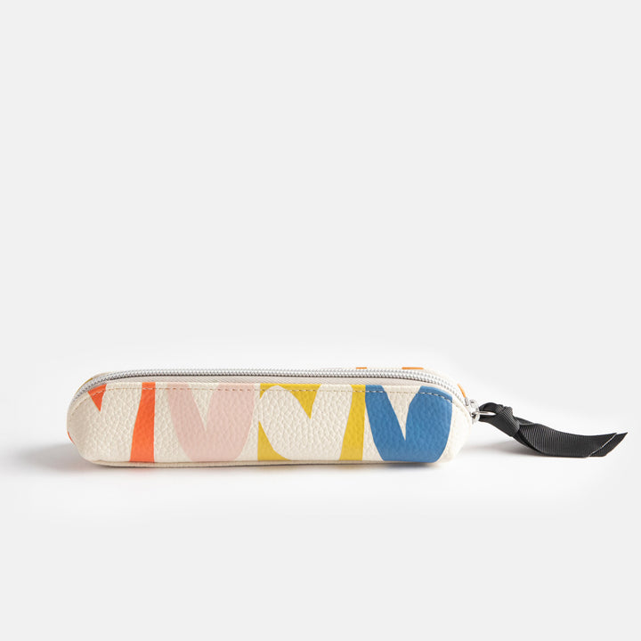 leather look PU slim pencil case in a multicolour hearts design with a black ribbon zip pull and pink striped lining