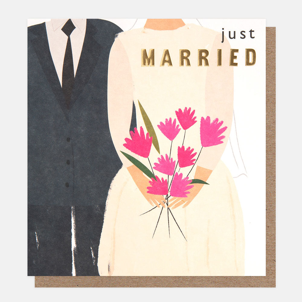 groom & bride holding flowers just married wedding card