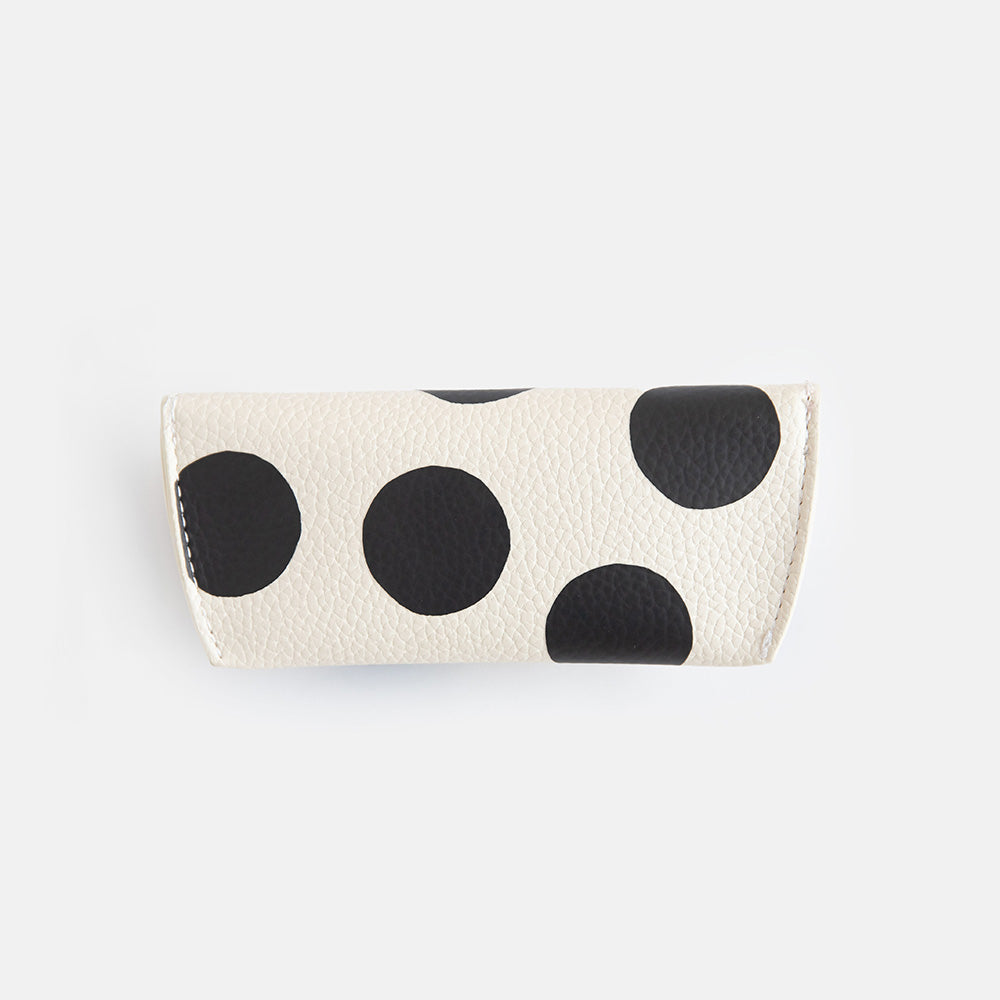 leather look PU flap close glasses case in monochrome spot print with suedette lining and hidden silver popper close