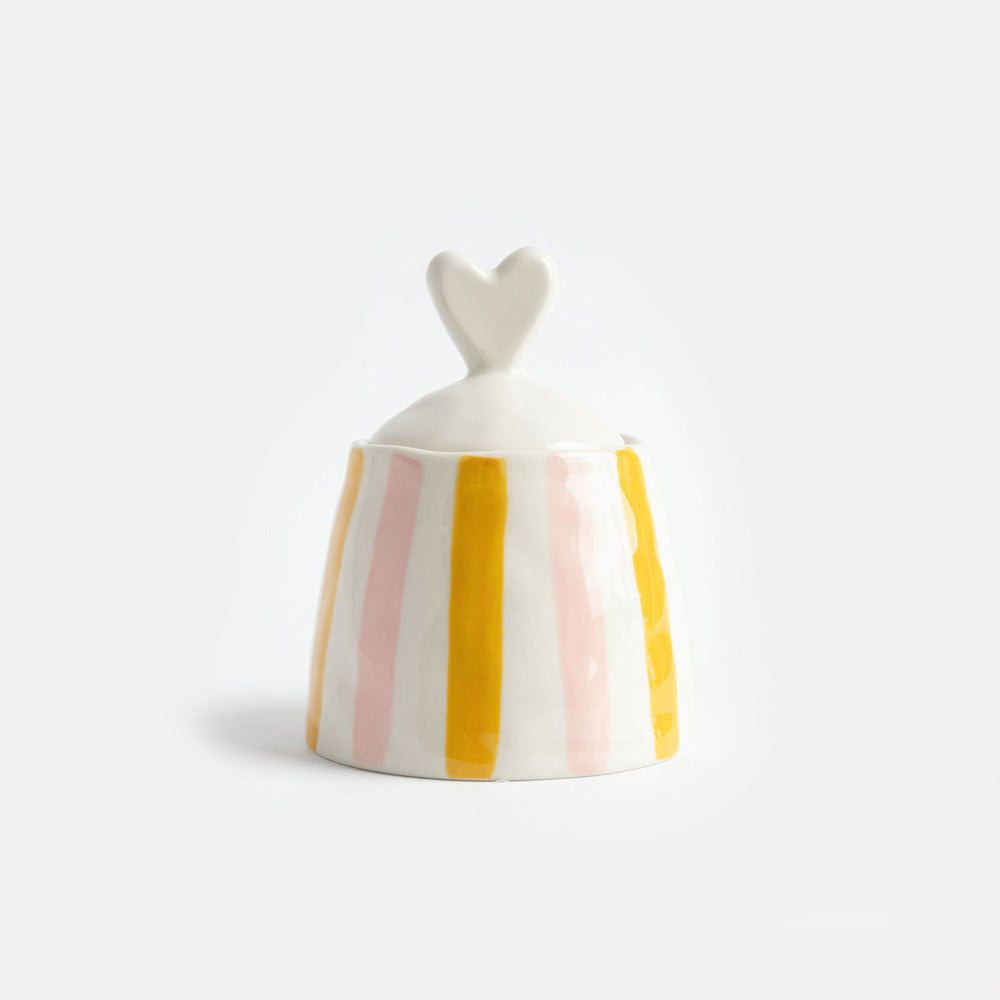 hand painted glazed ceramic stoneware sugar pot or trinket storage pot with a pink and mustard stripe design and heart shaped lid