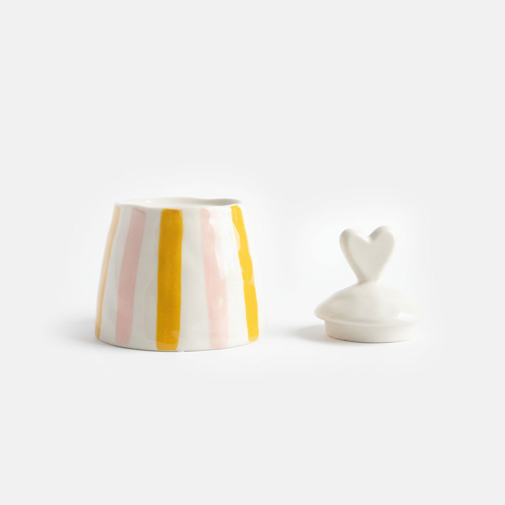 hand painted glazed ceramic stoneware sugar pot or trinket storage pot with a pink and mustard stripe design and heart shaped lid