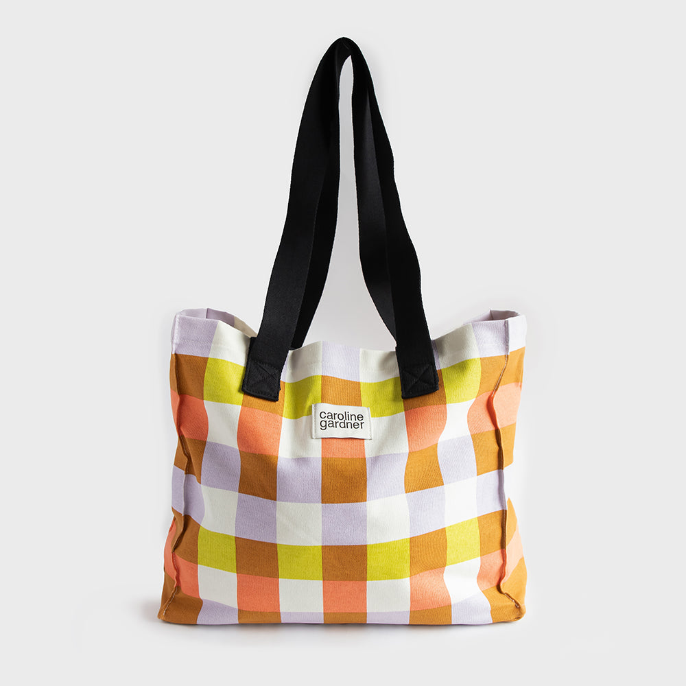 large cotton canvas tote or shopper bag in multi coloured check print with grab and shoulder straps