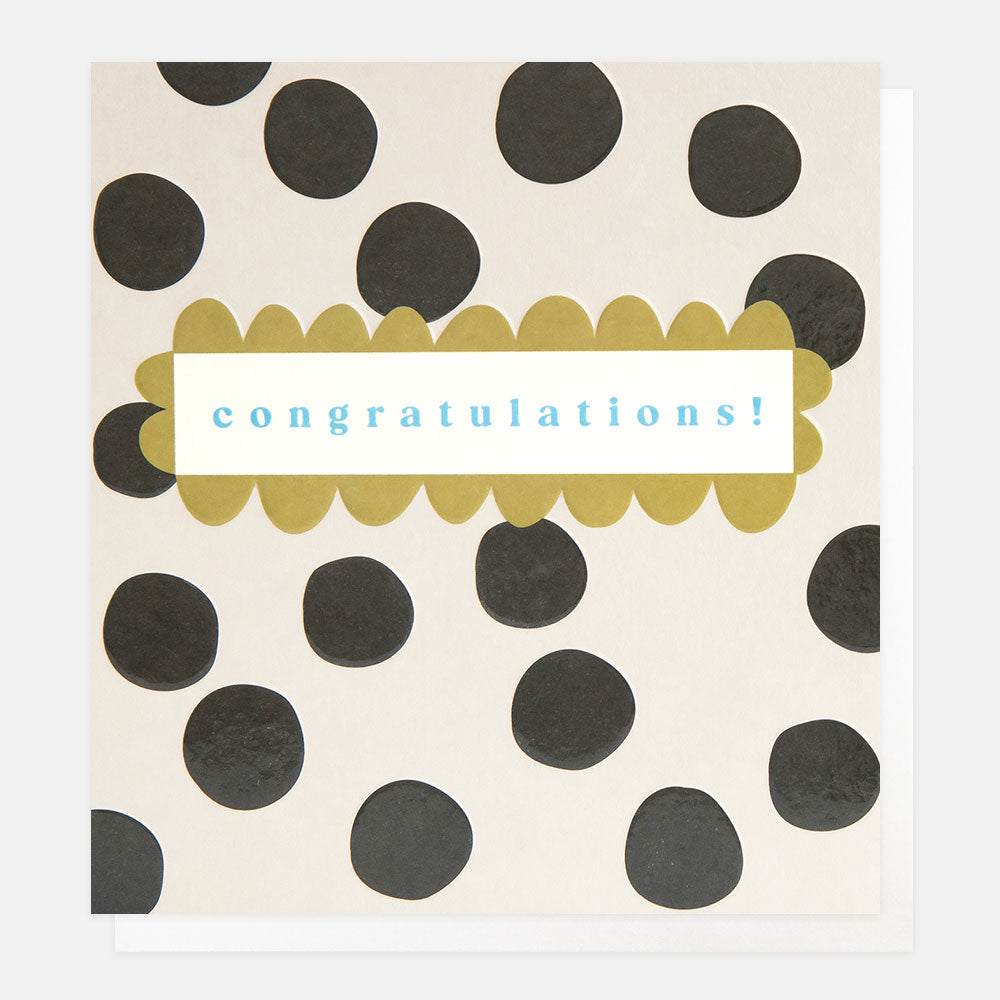 greeting card reading 'congratulations!' in a scalloped green frame on a black spots background