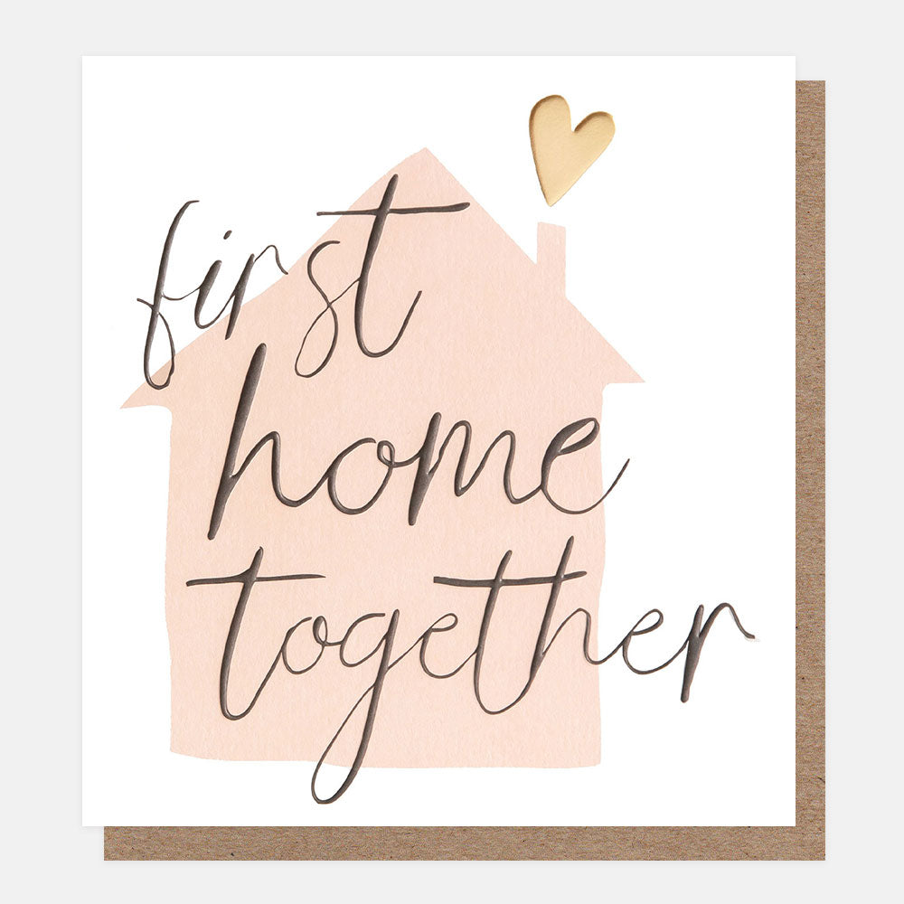 new home card featuring a pink house gold heart and the words first home together