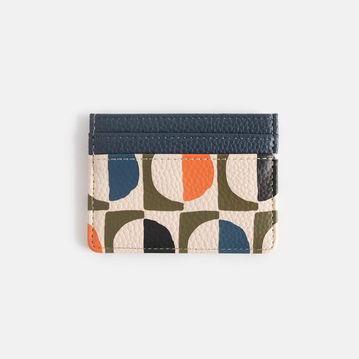 leather look card holder wallet in retro geometric circles design in orange, green, white & blue