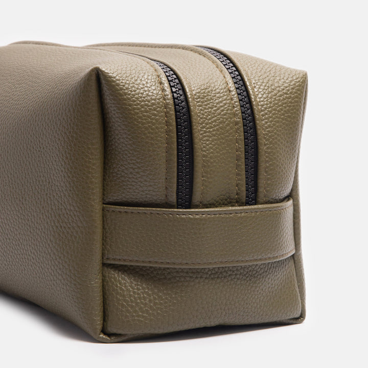 green leather look large travel washbag with double zip opening and grab handle