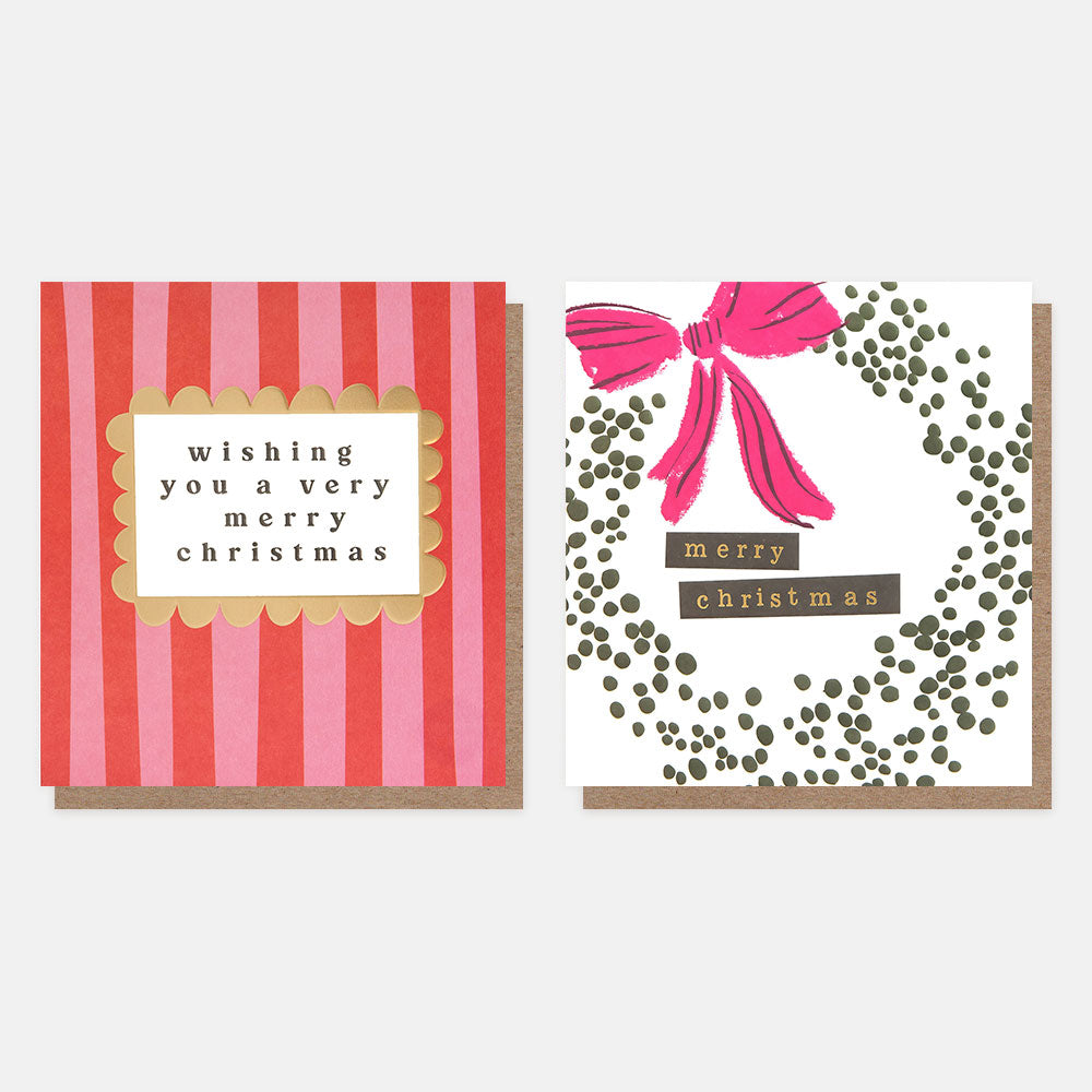 Two Christmas cards with different designs, one with pink/red candy stripes and the message wishing you a very merry Christmas, the other with a spotty wreath and pink bow