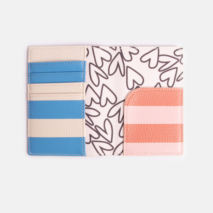 leather look PU passport & card holder in offset pink & blue stripe design with heart print lining