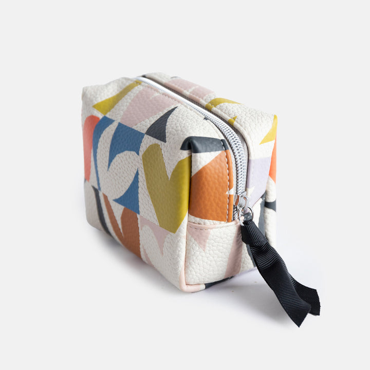 small cosmetics or wash bag with a colourful heart grid print