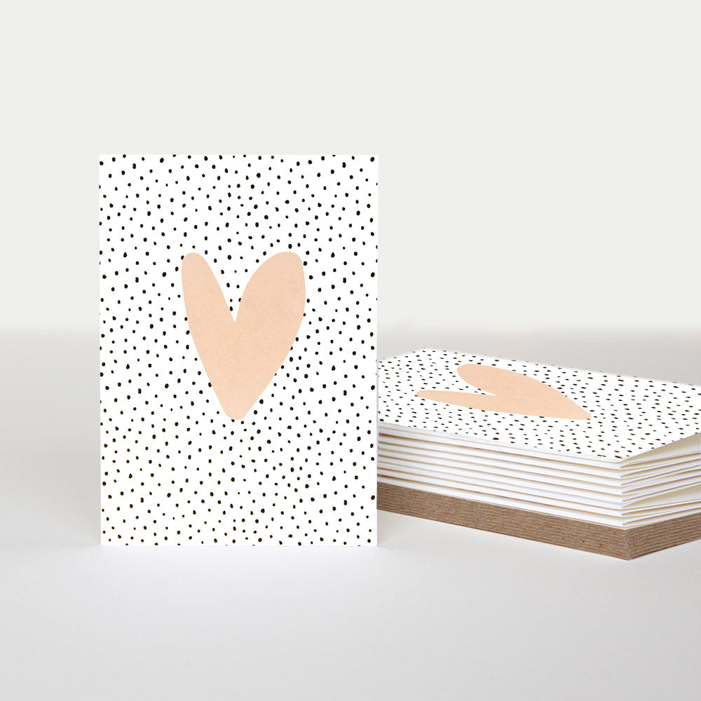 black notecards pack featuring a pink heart on a dotty background