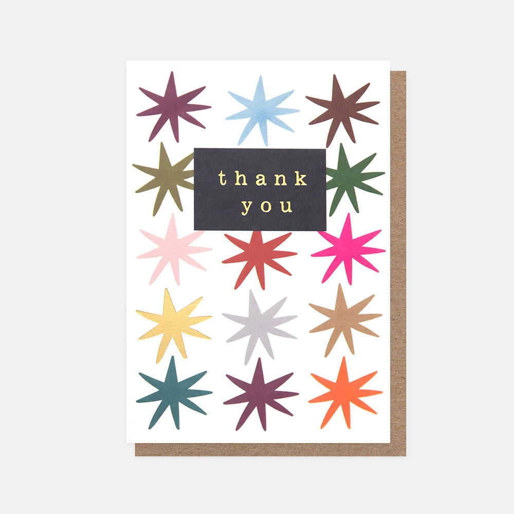 Greeting card with colorful star patterns and 'thank you' text on a white background