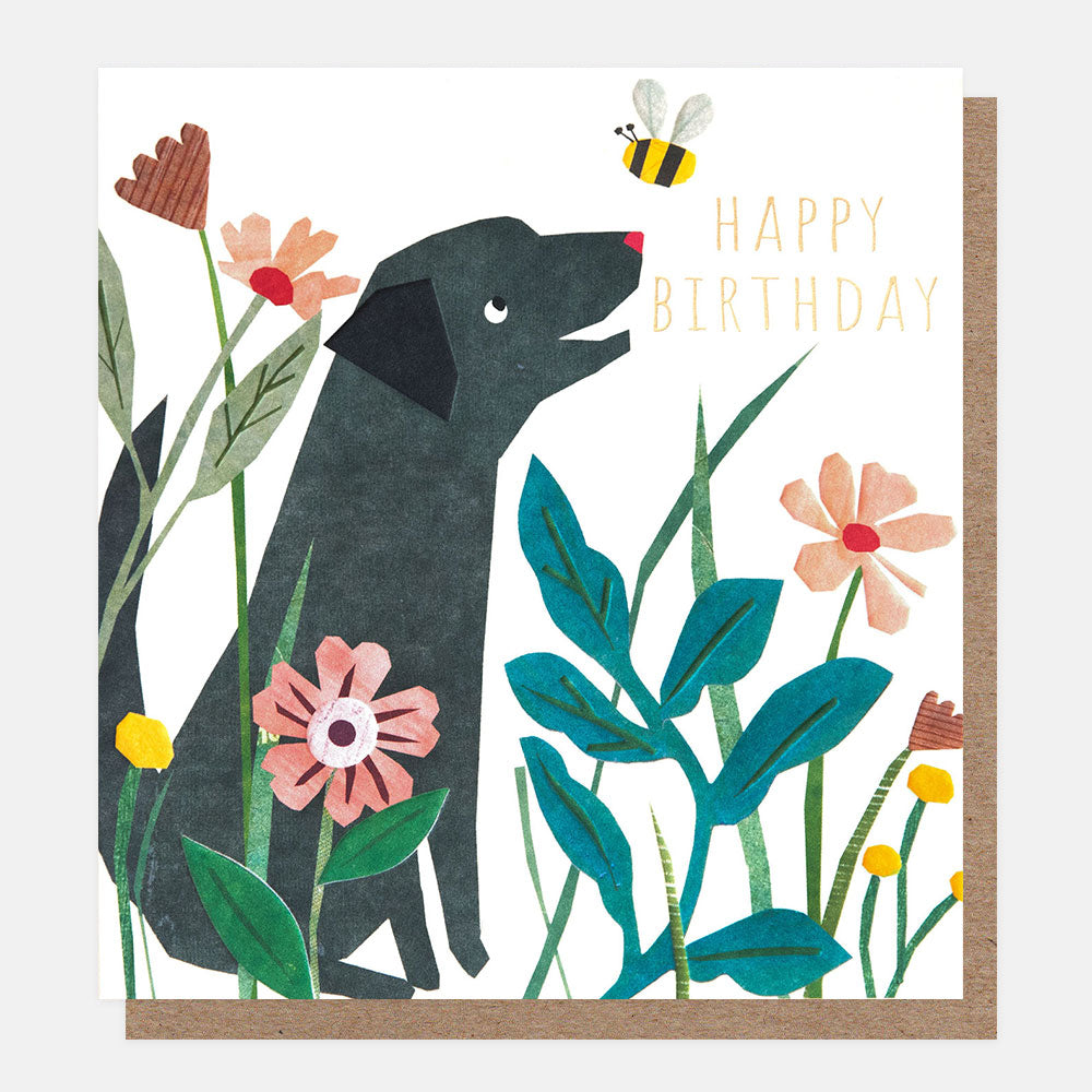 happy birthday card with a black dog and bumblebee in colourful flowers