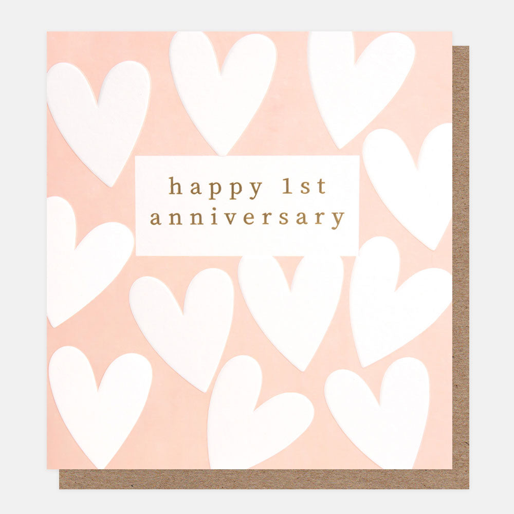 white hearts on pink background happy 1st anniversary card