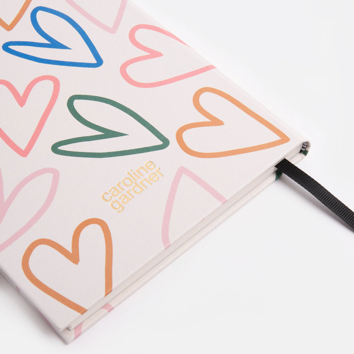 Multi coloured hearts print slim hardback notebook
