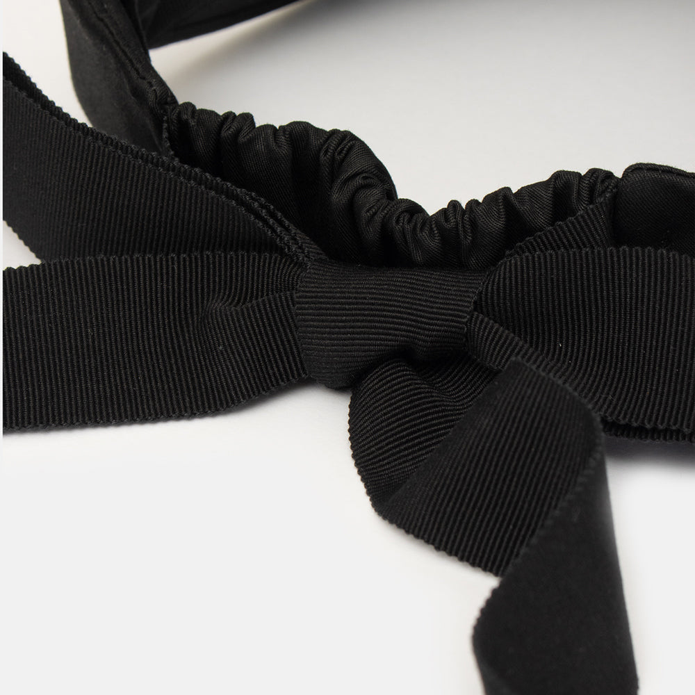 natural straw visor black ribbon tie
