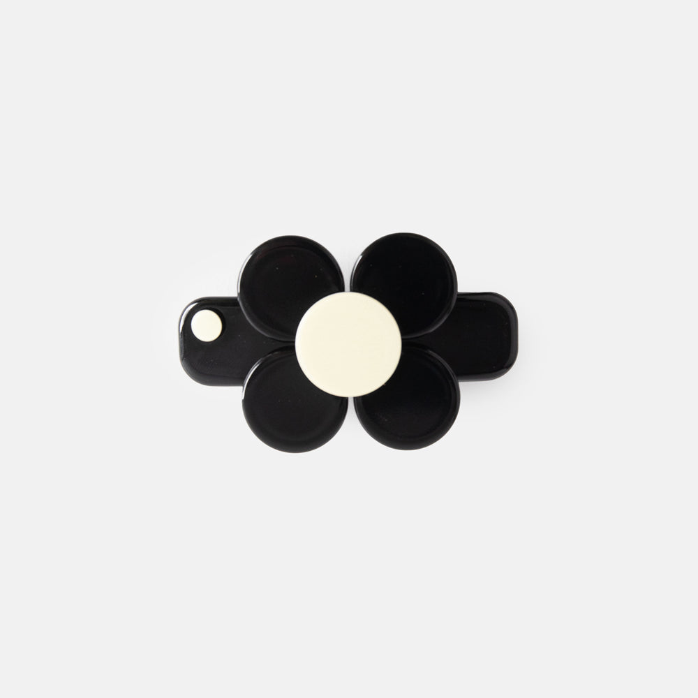 mini hair clip in black with black and cream flower design