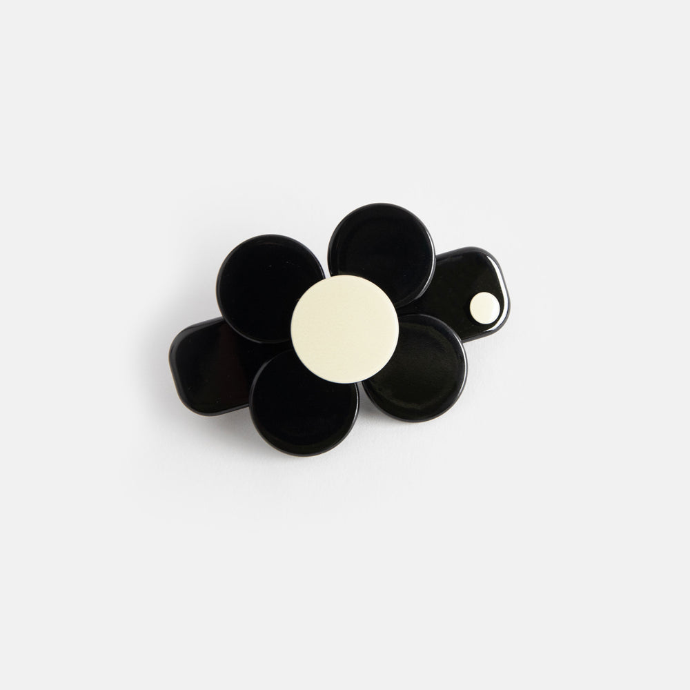 mini hair clip in black with black and cream flower design