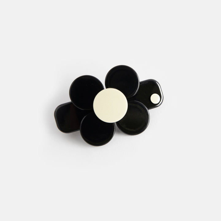 mini hair clip in black with black and cream flower design