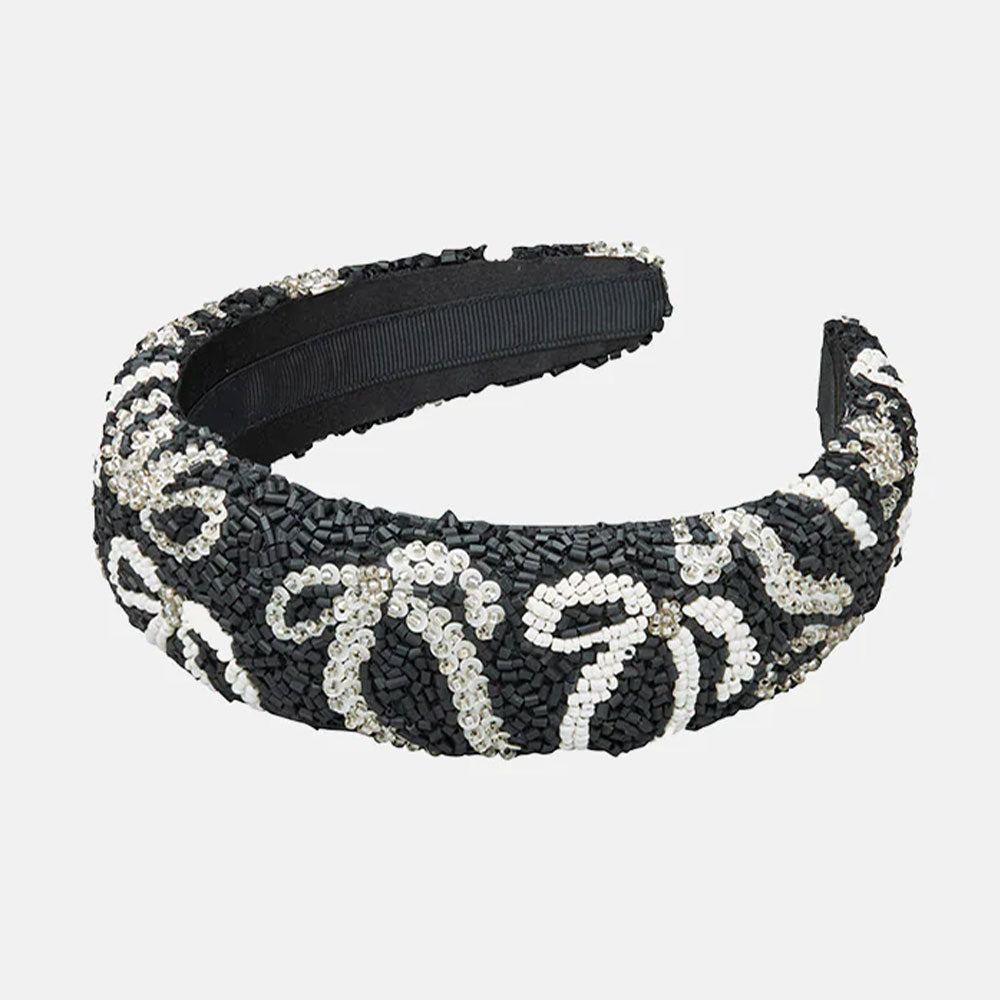 handmade beaded headband in black with white bow design