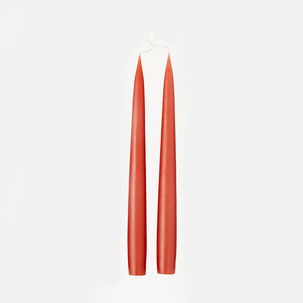 set of 2 25cm rust orange tapered dinner candles, made by Candle Flair