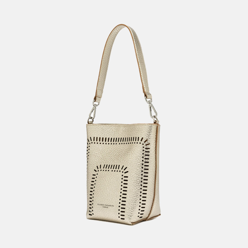 gold leather bucket tote bag with cut out design and separate crossbody and shoulder straps