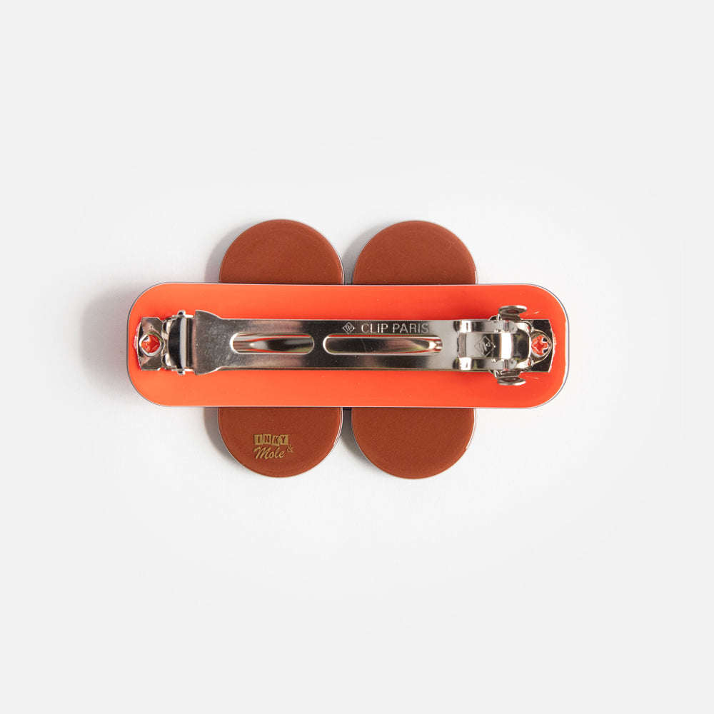 reverse of brown & orange flower hair clip