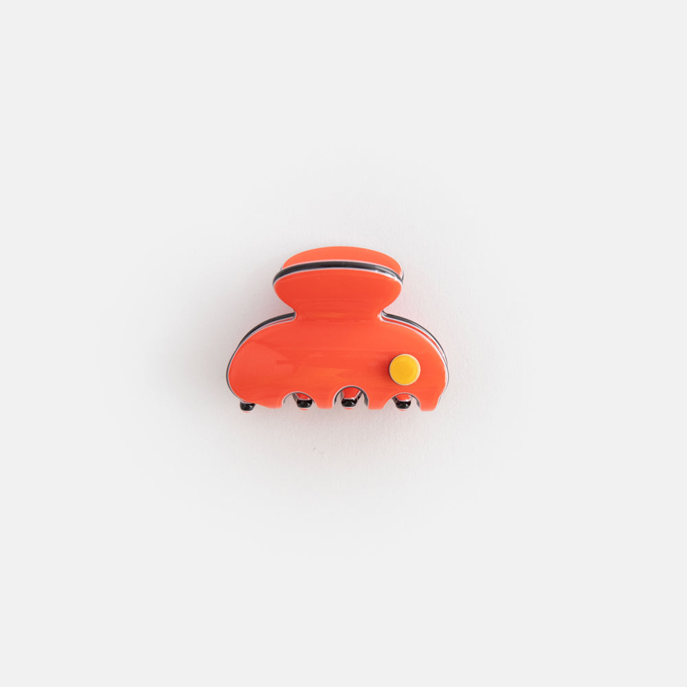 bright orange with black trim hair claw