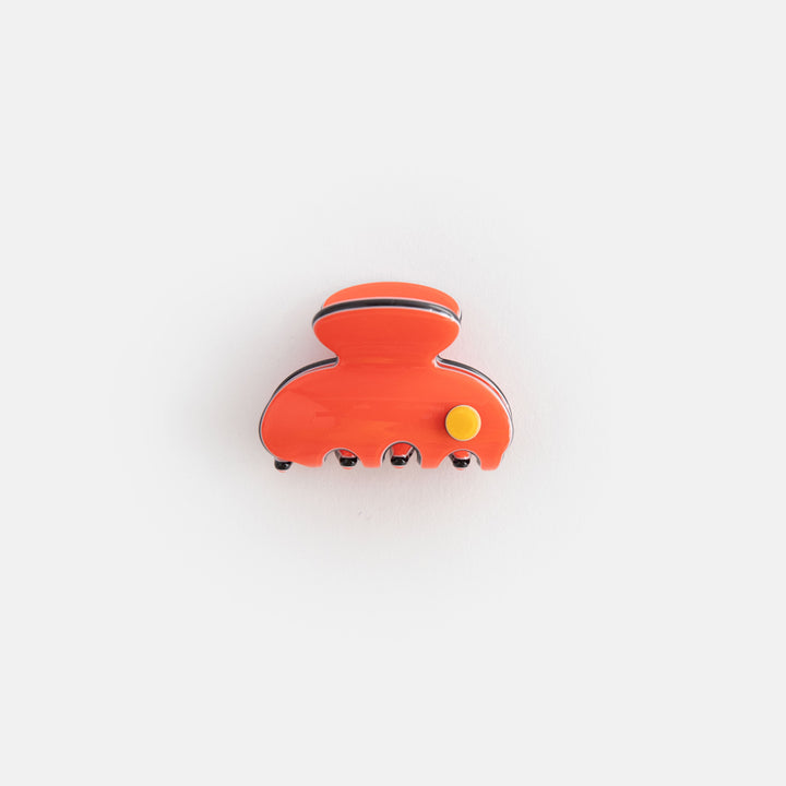 bright orange with black trim hair claw