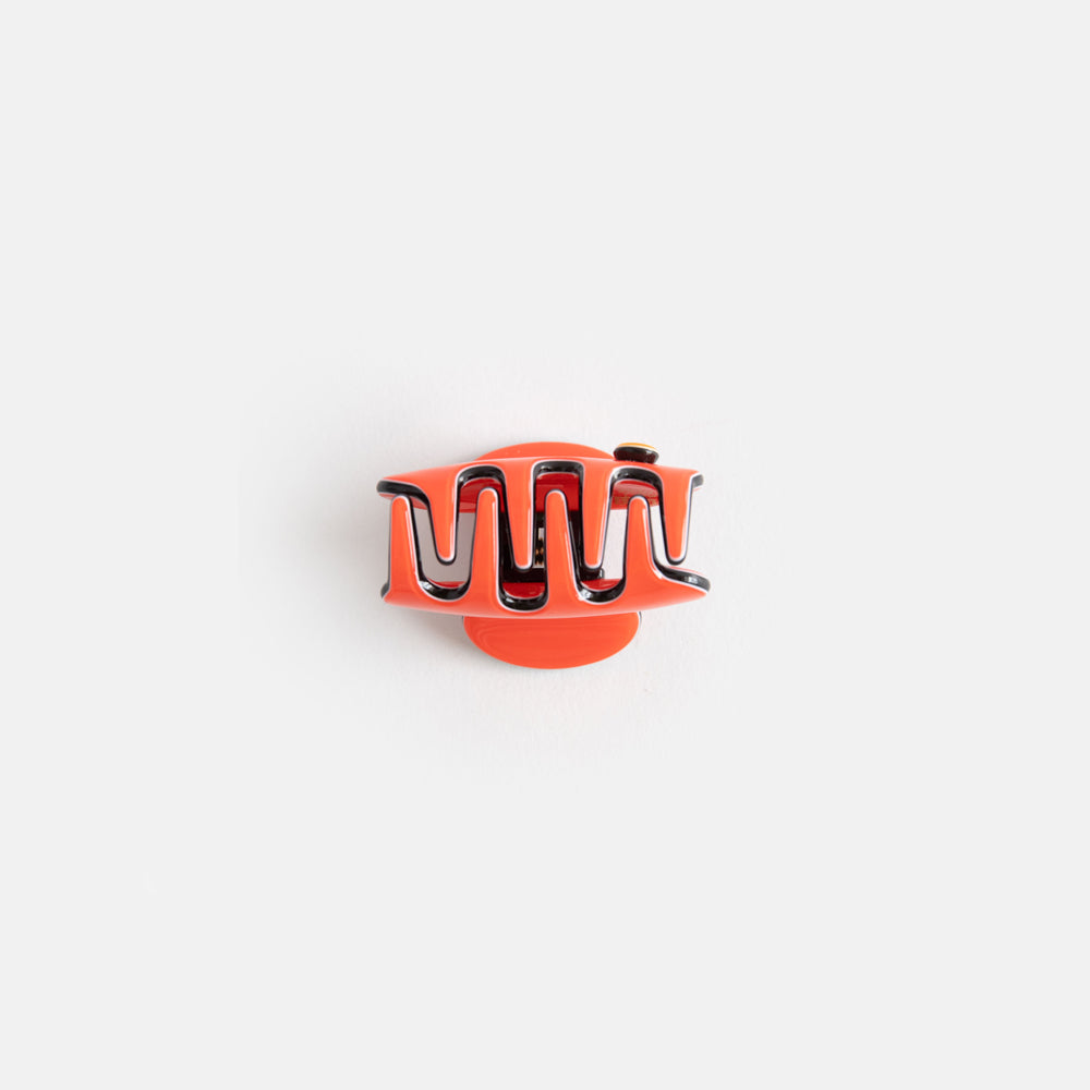 bright orange with black trim hair claw