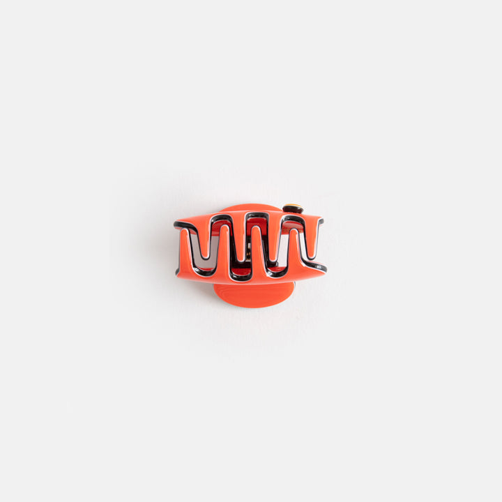 bright orange with black trim hair claw
