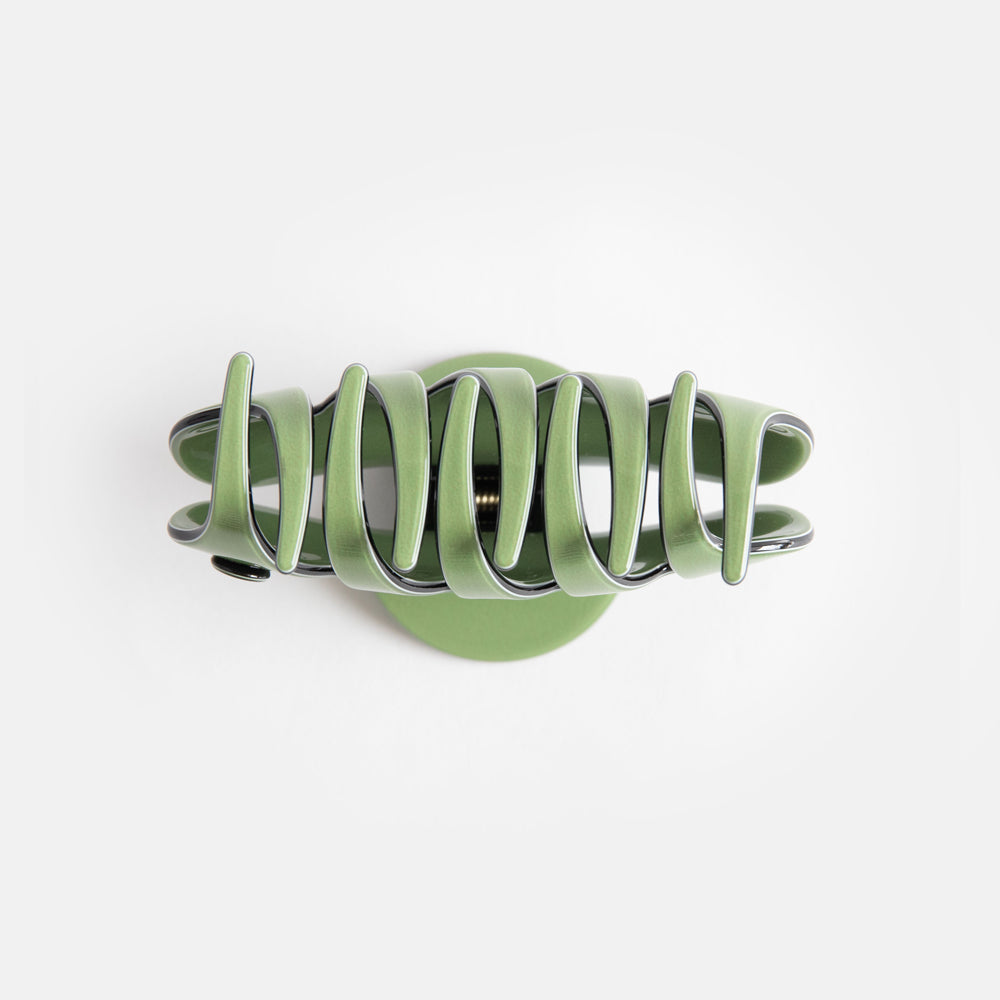 green with black trim hair claw with cutaway teeth
