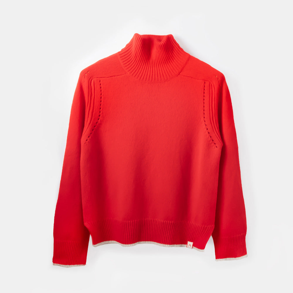 Red turtleneck sweater on a white background