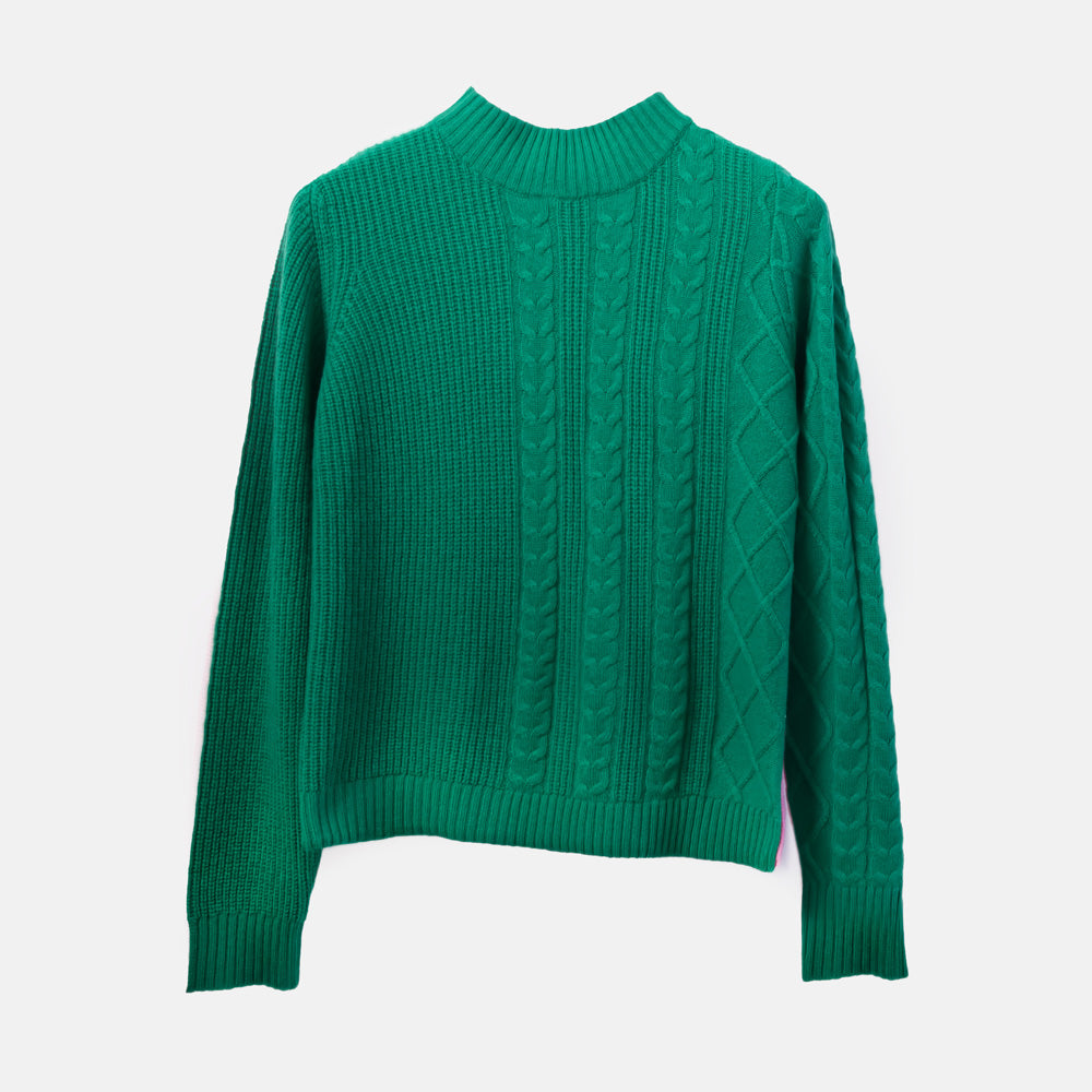 Green sweater with cable knit pattern on a white background