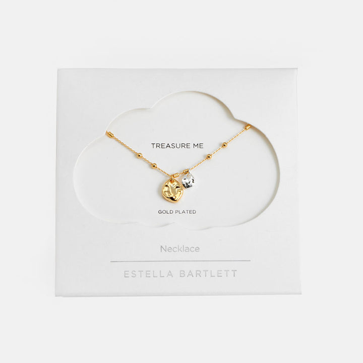 fine gold chain & bead necklace with two hammered pebble charms, one larger gold pebble and one smaller silver pebble