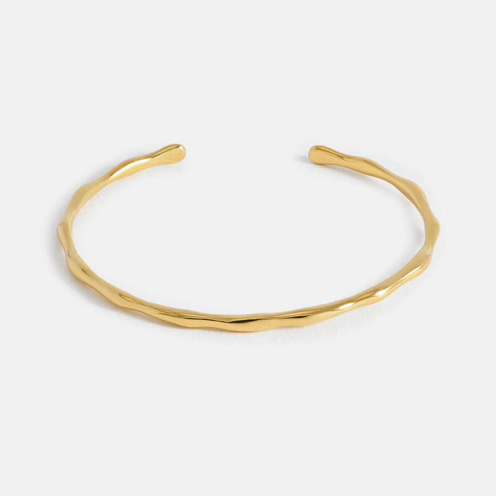 gold open bangle, made by estella bartlett