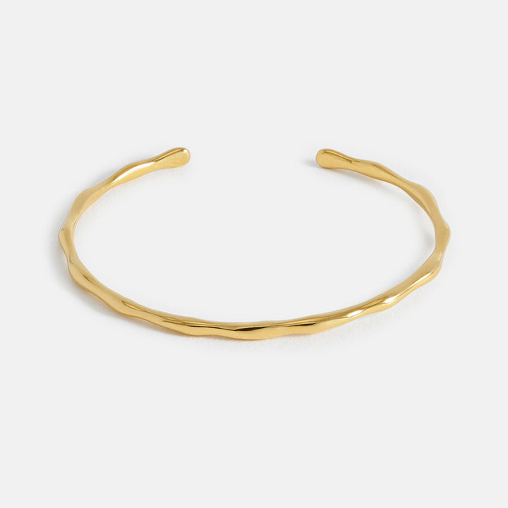 gold open bangle, made by estella bartlett