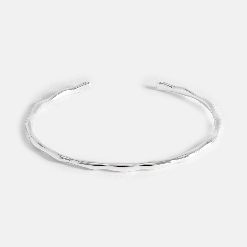 silver open bangle, made by estella bartlett